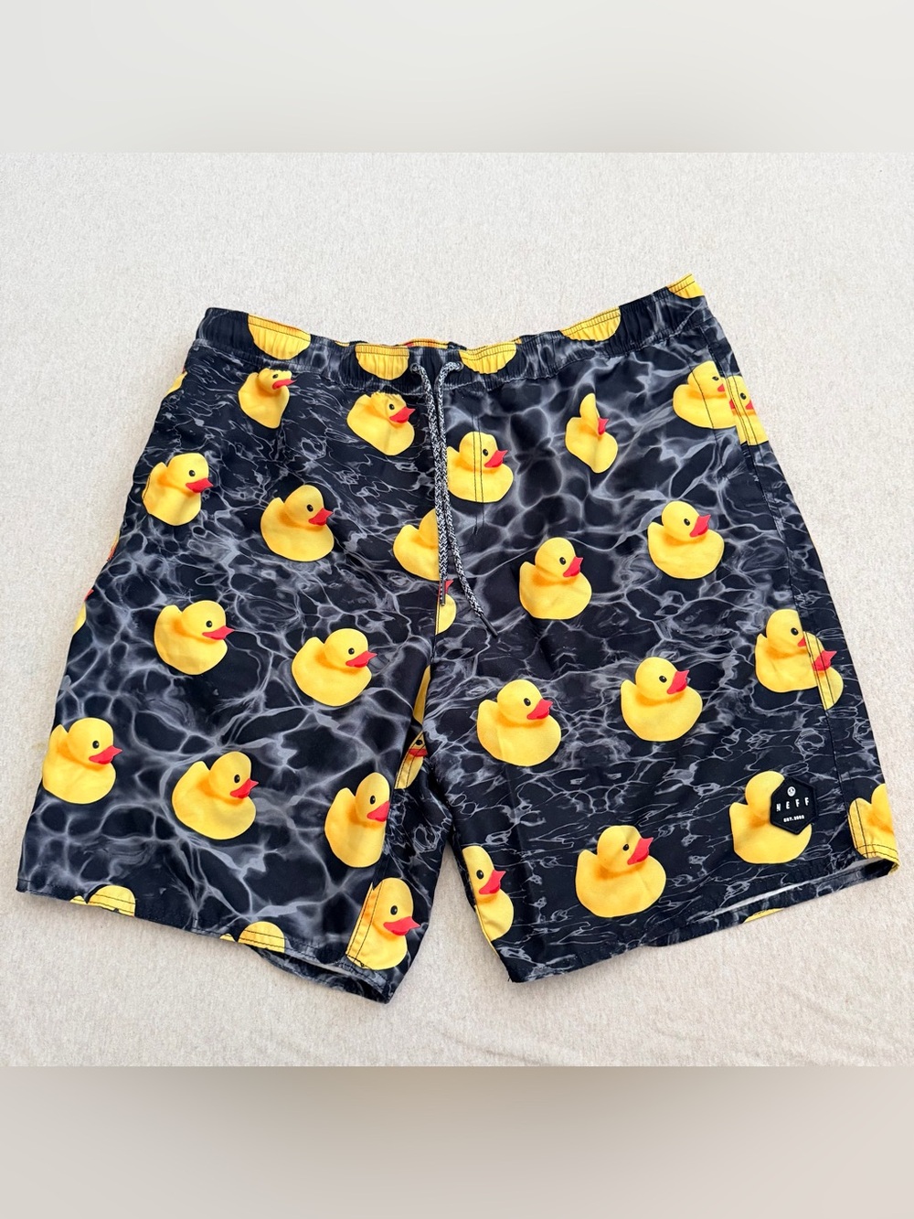 NEFF men’s rubber duck print swim trunks